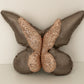 Cuscino farfalla in pelle e paillettes